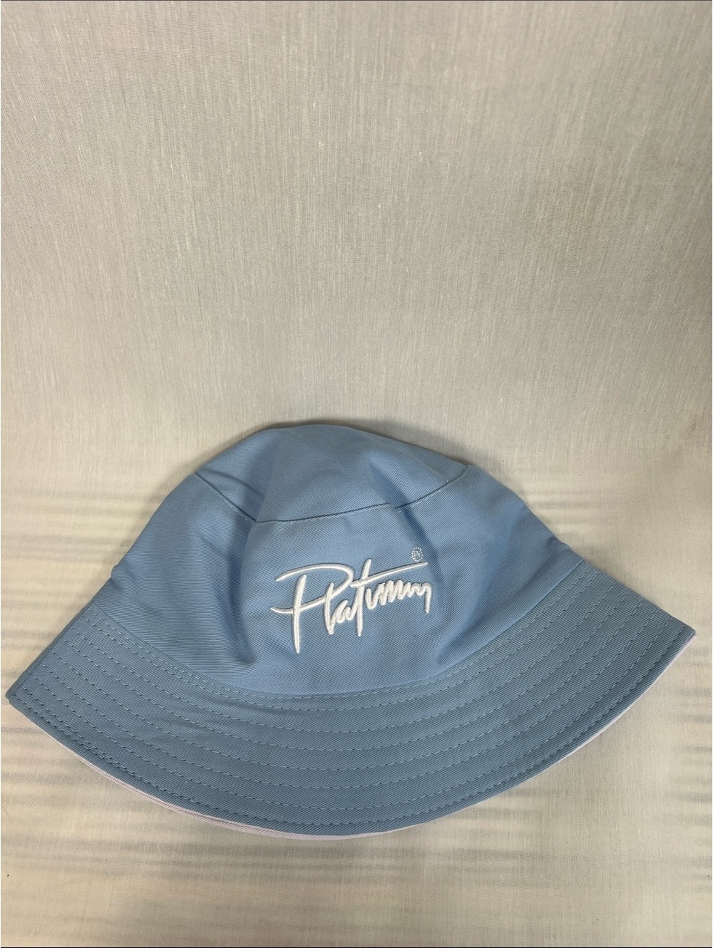 Platinum Script Logo Light Blue and White Reversible Bucket Hat